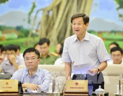  Tổng Thanh tra Chính phủ Lê Minh Khái trình bày báo cáo (tóm tắt) về công tác phòng, chống tham nhũng. Ảnh: Trọng Đức - TTXVN